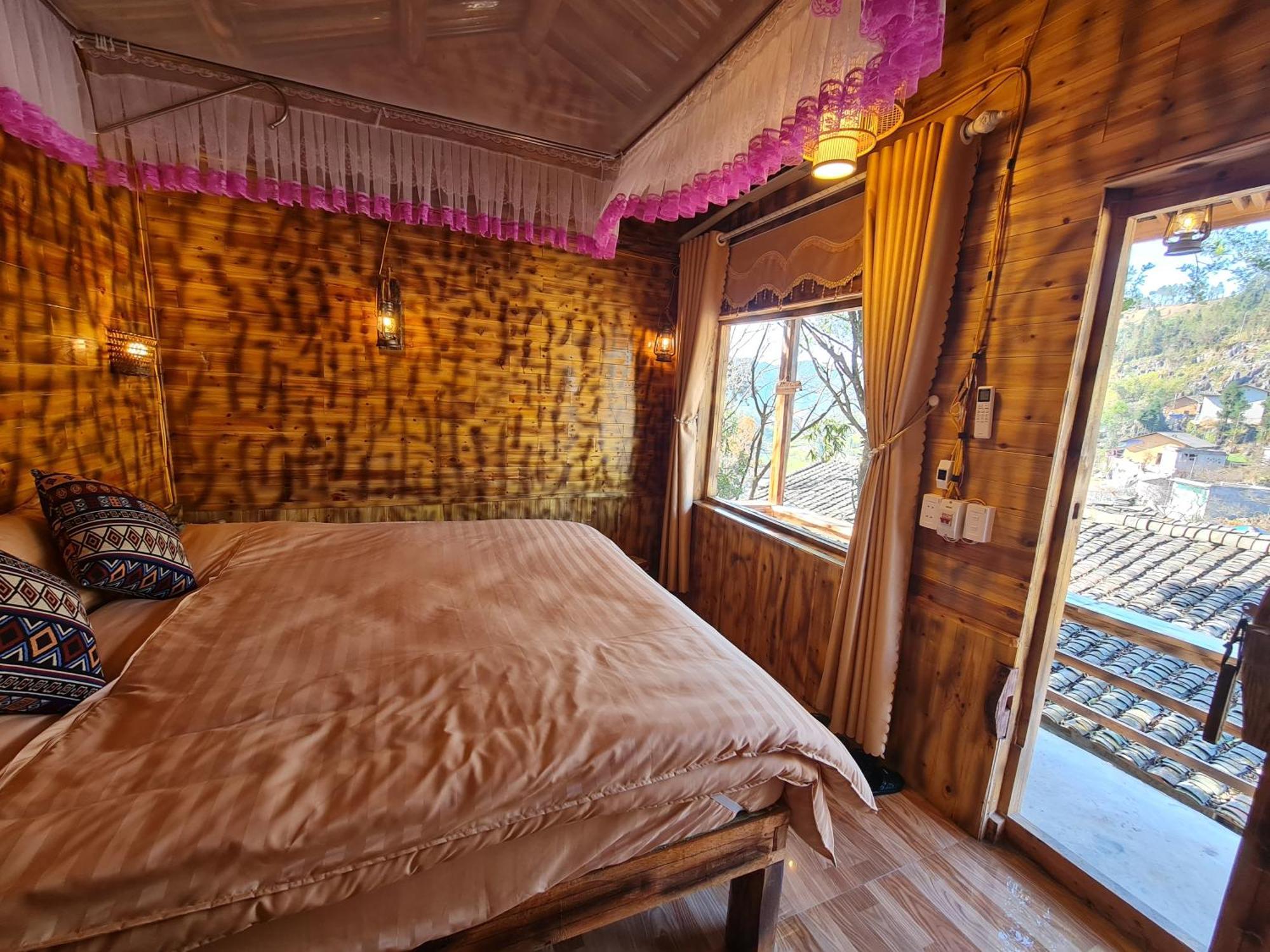 Nha Co Lao Xa Homestay Hmong & Bungalow Air Conditioner Dồng Van Bagian luar foto